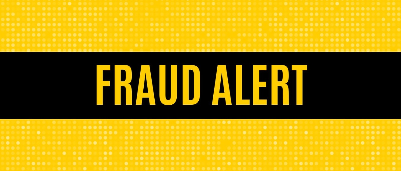 Gold text on a black background says Fraud Alert