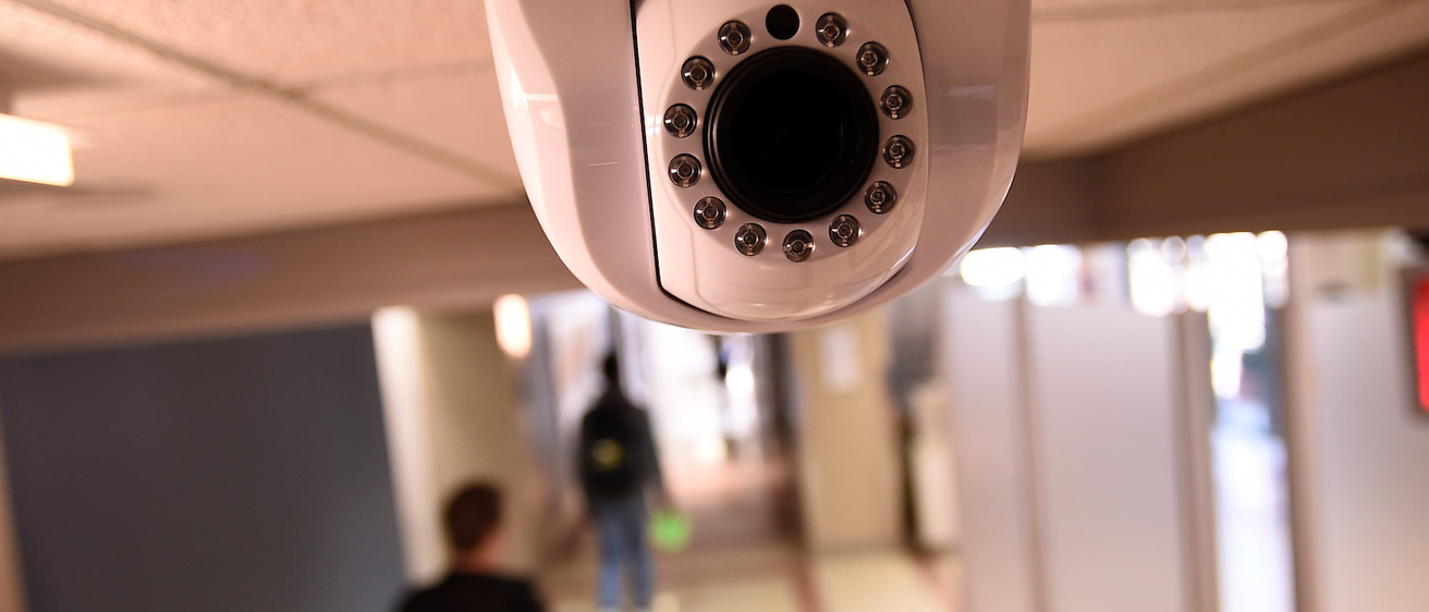 Security camera in a hallway.